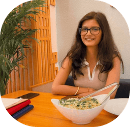Nikunj at a cafe table