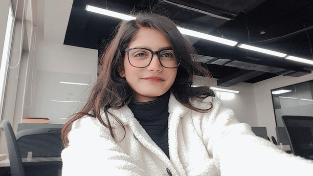 office selfie in a fuzzy coat