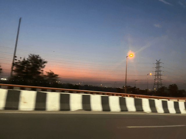 dusk over the highway on a commute