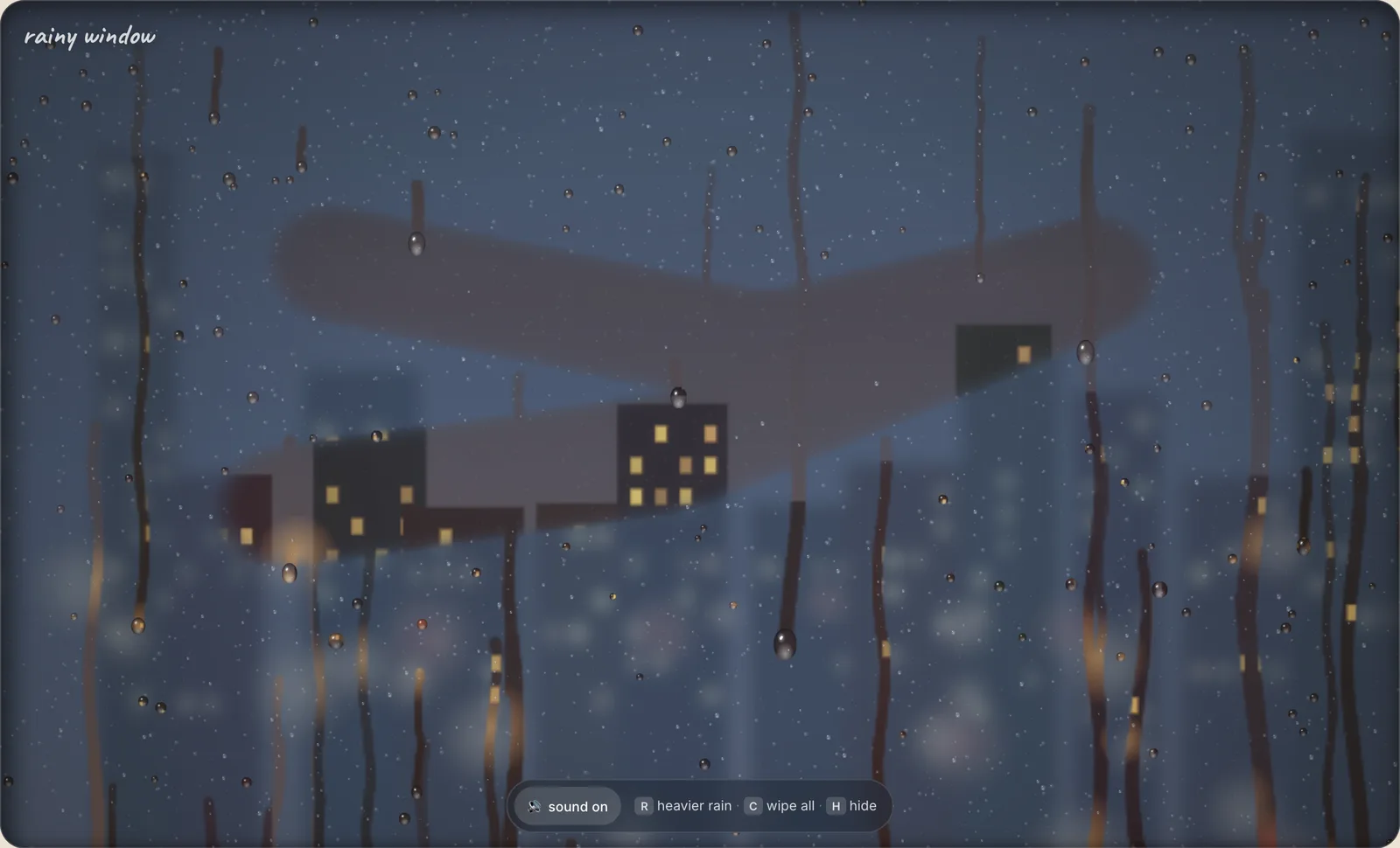 Rain on the glass with one streak wiped clear